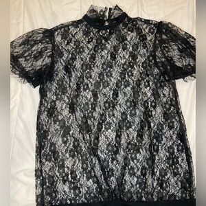 Lux black lace top. No inside tank. Stretchy. Size Large.